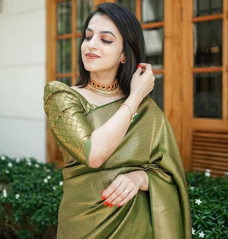 Bottle Green Saree With A Bottle Green Blouse
