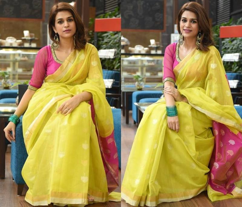 Plain Yellow Saree With A Bold Red Blouse
