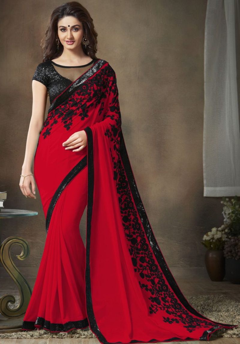 Red Saree with Floral Patterns Black Border